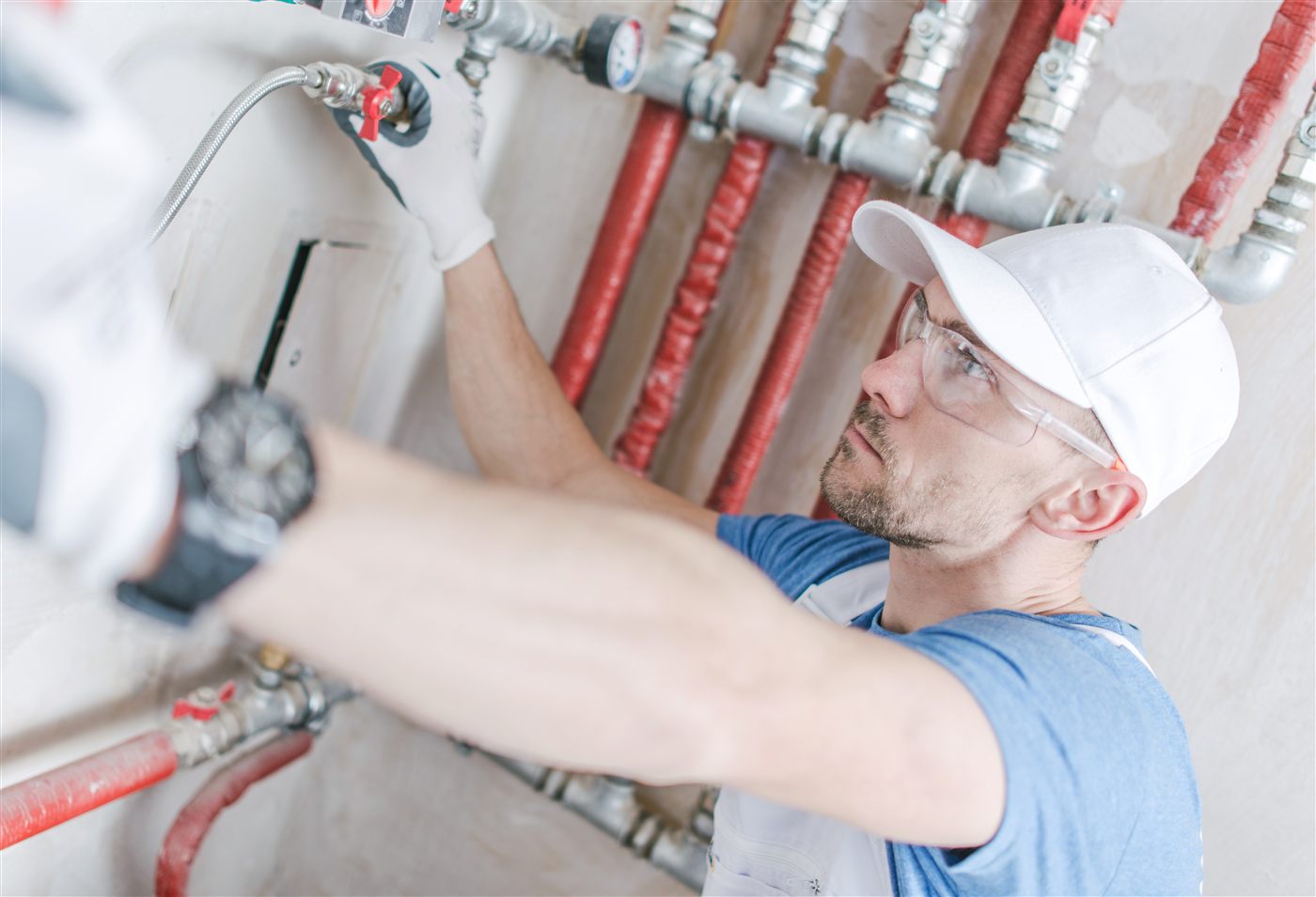 Ventura County plumber working on residential bathroom plumbing